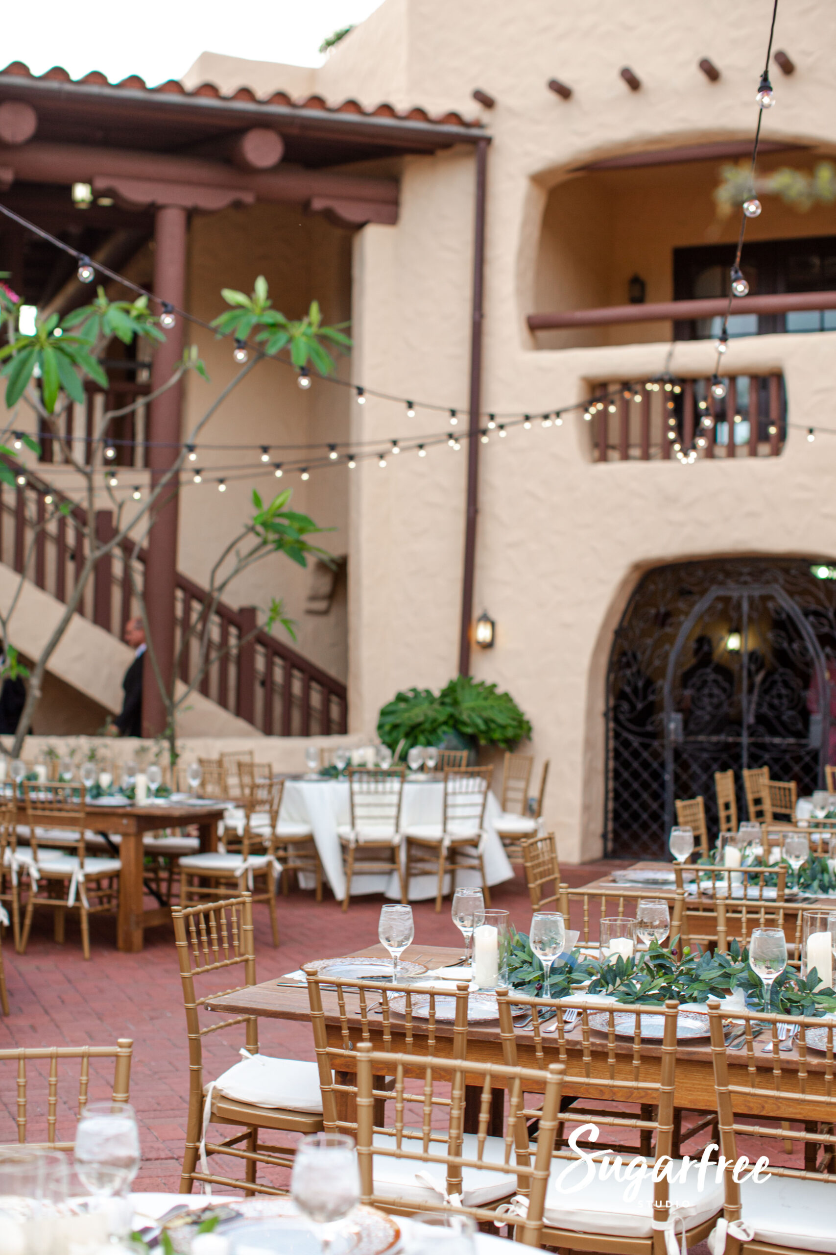 Curtiss Mansion courtyard wedding with string lights