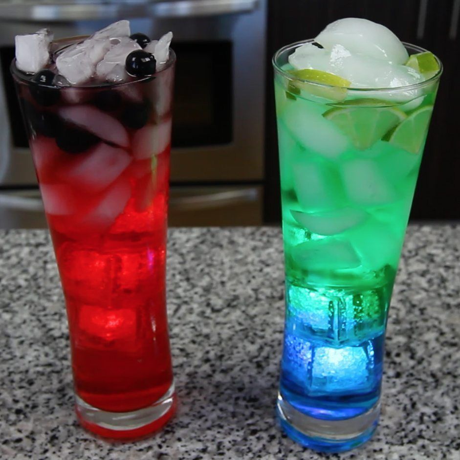 A red dark-side drink and a green Jedi drink with glowing ice cubes